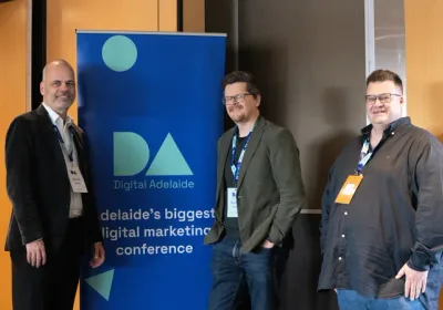 Group of attendees in front of the Digital Adelaide banner.