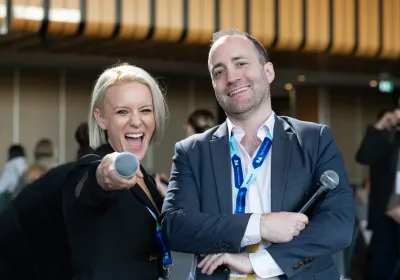 Event hosts laughing together at Digital Adelaide.